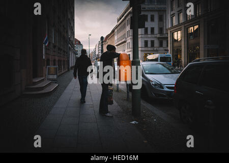 Berlin, Germany. 21st Nov, 2016. A man is picking into a trash basket and looks for a deposit bottle, taken on 21.11.2016 in Berlin. Photo: picture alliance/Robert Schlesinger | usage worldwide/dpa/Alamy Live News Stock Photo