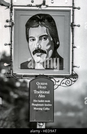 The Queen's Head pub in Bolney, with their new pub sign, showing a picture of Queen lead singer Freddie Mercury. Stock Photo