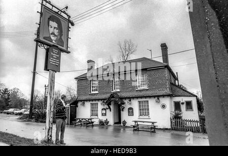 The Queen's Head pub in Bolney, with their new pub sign, showing a picture of Queen lead singer Freddie Mercury. Stock Photo