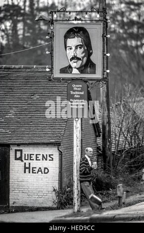 The Queen's Head pub in Bolney, with their new pub sign, showing a picture of Queen lead singer Freddie Mercury. Stock Photo