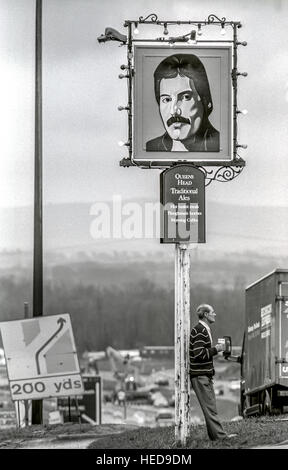 The Queen's Head pub in Bolney, with their new pub sign, showing a picture of Queen lead singer Freddie Mercury. Stock Photo