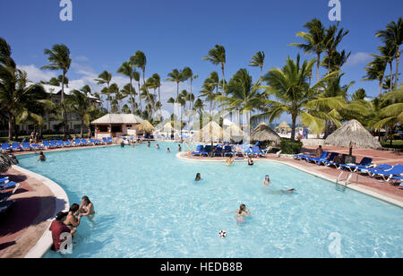 Tourists at the swimming pool at Grand Oasis Holiday Resort in Punta Cana, Dominican Republic, Caribbean Stock Photo