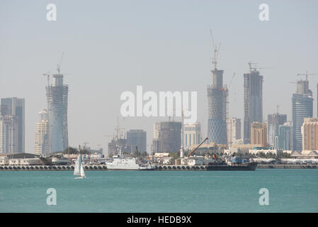 Panoramic view across Doha Bay, view of the cove of the West Bay District with its skyscrapers and building sites, Doha, Qatar