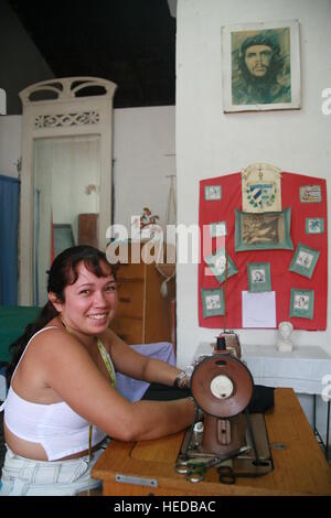Female worker in a small sewing room, Trinidad, Sancti-Spíritus Province, Cuba, Latin America Stock Photo