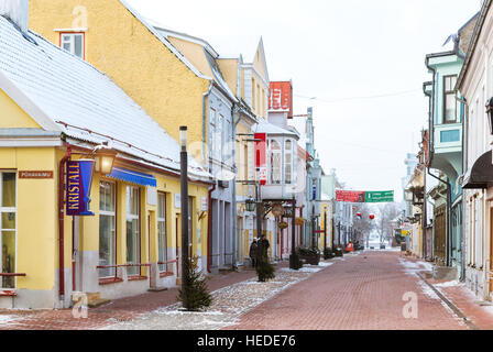 Parnu, Estonia - January 10, 2016: Architectural diversity in centre of resort Estonian town Parnu. Historic brick buildings and attractions. Snow Stock Photo