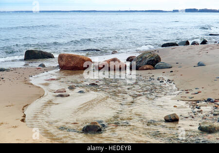 sea wave coast of the Baltic sea, blue sea, waves beat on the rocks Stock Photo