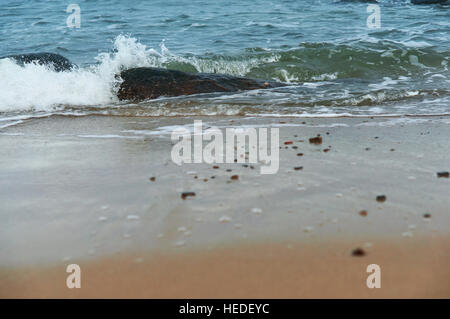 sea wave coast of the Baltic sea, blue sea, waves beat on the rocks Stock Photo