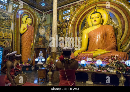 Buddhist Ceremony in Gangaramaya Temple, Colombo, Sri Lanka Stock Photo