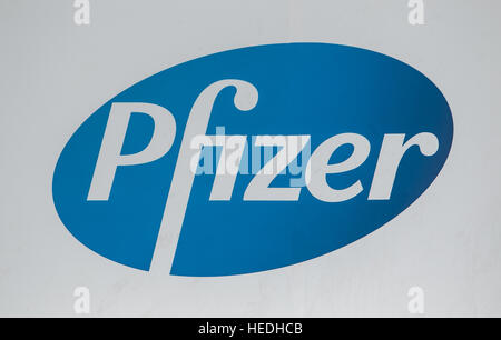 Pfizer sign on the exterior wall of their headquarters in Manhattan. Stock Photo