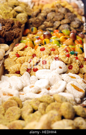 Various type of cakes close up on Christmas market Stock Photo