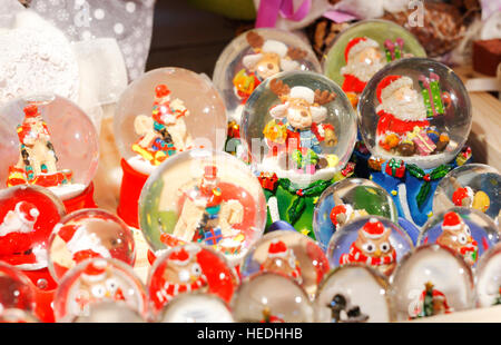 Christmas snow globes on the street market Stock Photo