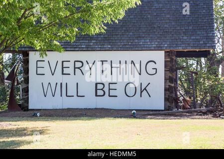 A sign saying everything will be ok on an old barn Stock Photo
