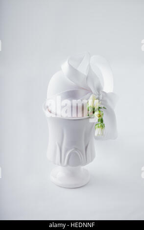 Easter Egg packed as a gift on white background Stock Photo