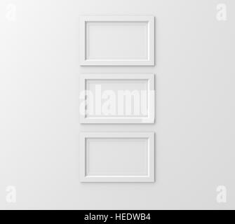 three right tilt blank photo frames hanging on the wall, 3d rendering ...