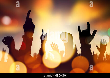 Music concert crowd hands raised in air during live performance on stage, abstract illustration Stock Photo
