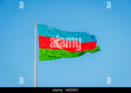 Azeri flag waving in wind at National flag square, Baku, Azerbaijan Stock Photo