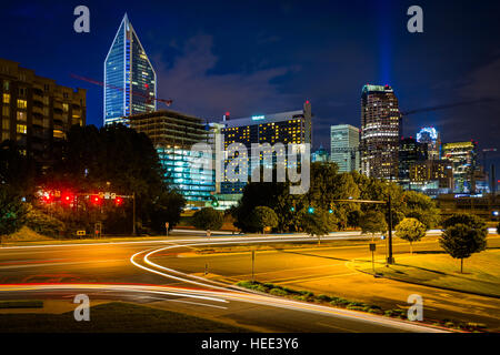 View of South Boulevard and the Charlotte skyline at night, in Uptown Charlotte, North Carolina. Stock Photo