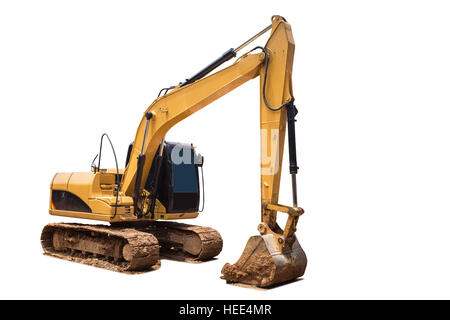 Old yellow excavator in construction site isolated on white background. Saved with clipping path Stock Photo
