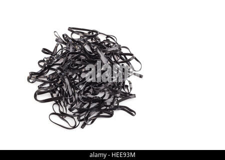 Close up pile of black rubber ring isolated on white background Stock Photo