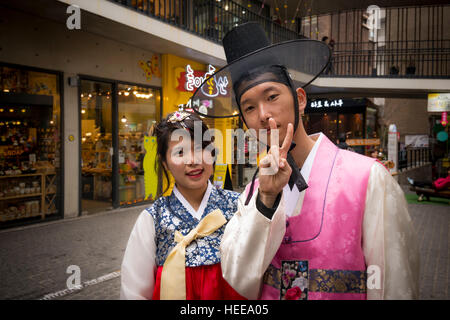 Young couple wearing Korean traditional costume (Hanbok), Insa-dong, Jongno-gu, Seoul, Korea Stock Photo