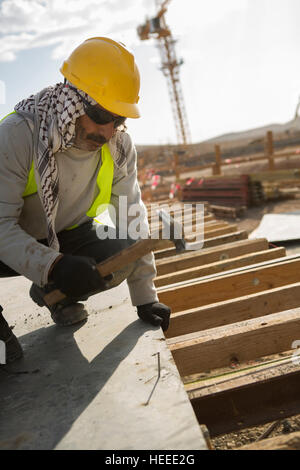 Workers construct the As-Samra waste water treatment plant in Zarqa, Jordan. Stock Photo