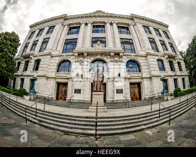 Panoramic image of Louisiana Supreme Court building with statue of