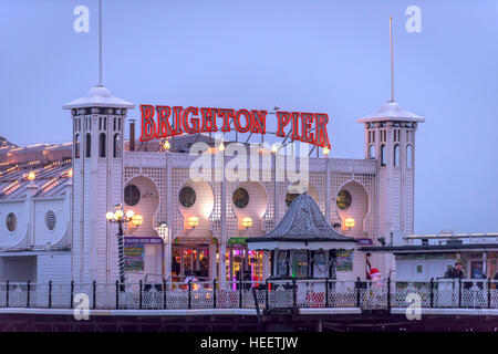 Brighton's Palace Pier at dusk Stock Photo