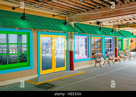 A colorful empty store front on Okaloosa Island in the Florida panhandle, a resort community on the Gulf of Mexico. Stock Photo