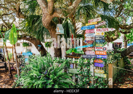 Colorful and funny directional signs in front of a small beach home at Grayton Beach, Florida USA. Stock Photo