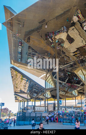 The historic Els Encants Flea Market in Barcelona, Spain with a permanent building and a gleaming mirrored roof 25 meters above. Stock Photo