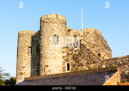 Rye town's historical 13th century Ypres Tower castle and museum. Known Formally as 'Baddings Tower'. Golden hour, clear blue sky. Stock Photo