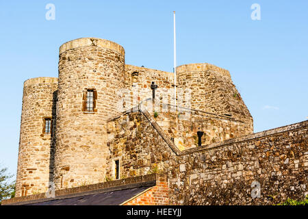 Rye town's historical 13th century Ypres Tower castle and museum. Known Formally as 'Baddings Tower'. Golden hour, clear blue sky. Stock Photo