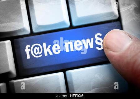 Fake news key on computer keyboard Stock Photo