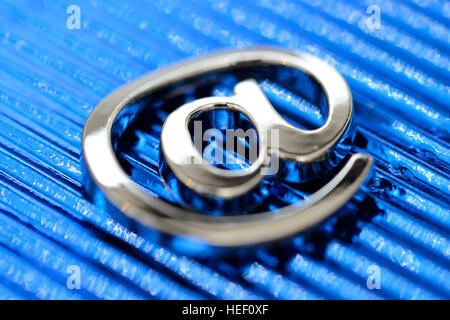 At sign on blue ground Stock Photo