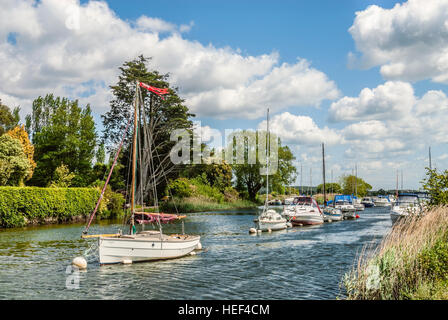 Sailing ship on the River Frome near Wareham with the Lady St.Mary church in the background, Dorset, South East England. Stock Photo