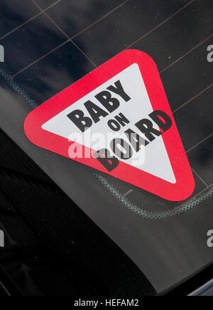 Bimbo a bordo or baby on board sign in rear window of car Sicily Italy  Stock Photo - Alamy