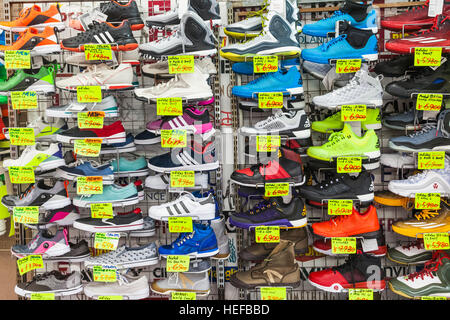 Japan, Honshu, Tokyo, Ueno, Ameyoko Shopping Street, Store Display of Trainers Stock Photo