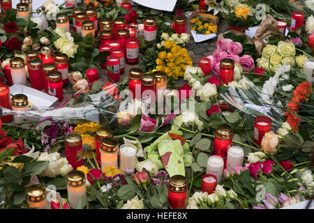 Candles and flowers at the  Christmas Market in Berlin, the day after the terrorist attack. Stock Photo