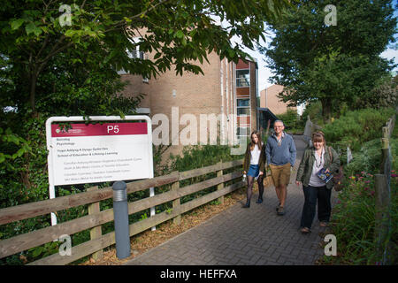 University Eduction in the UK: Sixth form students and their parents  visiting Aberystwyth University on an  Open Day  to tour academic departments , social facilities and student accommodation before deciding on whether to make an application to study for their degrees at the University. September 2016 Stock Photo