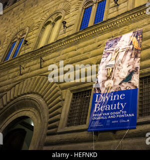 Banner hanging on wall of the Basilica of Santa Maria Novella, Florence, Tuscany, Italy Stock Photo