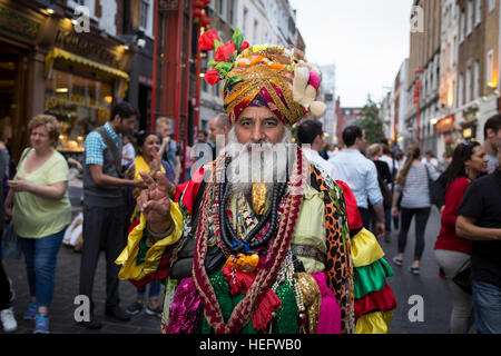 Every Saturday evening in London's Chinatown Hare Krishna devotee's meet and celebrate with the public Stock Photo