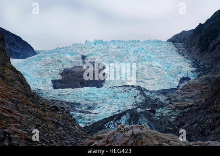 Turquoise glacial ice, glacier tongue, Franz Josef Glacier, Westland District, South Island, New Zealand Stock Photo