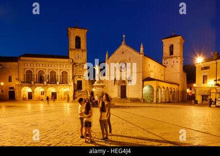 Palazzo Comunale and Basilica di San Benedetto, evening, Norica, Perugia, Umbria, Italy Stock Photo