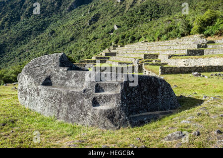 Mortuary rock at Machu Picchu, Incas ruins in the peruvian Andes at Cuzco Peru Stock Photo