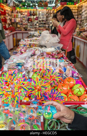 Shanghai, China - April 7, 2013: people in a souvenirs store in gucheng park at the city of Shanghai in China on april 7th, 2013 Stock Photo