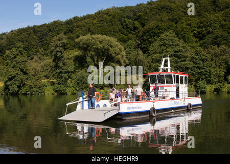 Germany, Ruhr Area, Witten, the river Ruhr in Witten-Herbede, small ferry boat for cyclists and walkers. Stock Photo