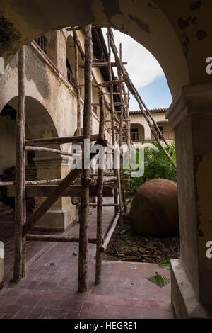 Wooden scaffolding along a wall in the courtyard of the Museo de San Juan Dios, Camaguey, Cuba Stock Photo