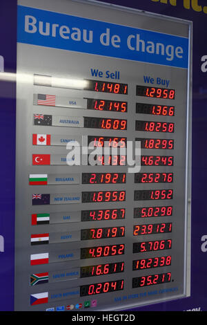 Bureau de Change display board showing rates of exchange. Stock Photo