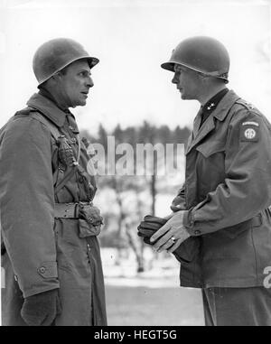 JAMES GAVIN at right as Commanding General of the 82nd US Airborne Division confers with General Matthew Ridgway Commander of the XVIII Airborne Corps on 19 December 1944 during the Battle of the Bulge. Photo US Signal Corps Stock Photo