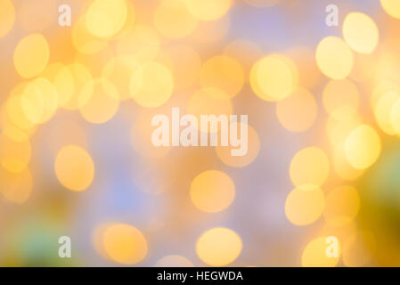 Abstract circular natural orange and yellow light bokeh background Stock Photo